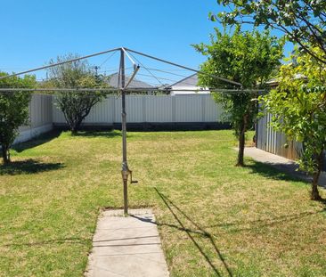 Stylish Family Home with Spacious Entertaining & Expansive Backyard - Photo 6