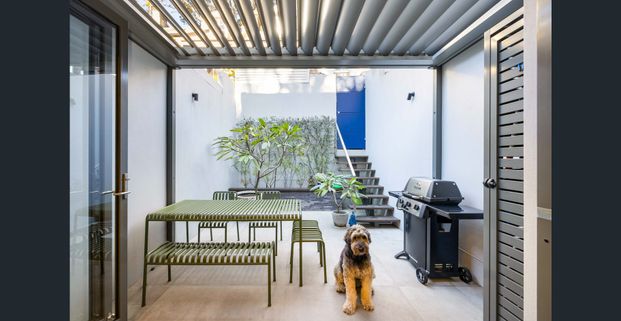 Immaculately renovated 3-level terrace in wide leafy setting - Photo 1