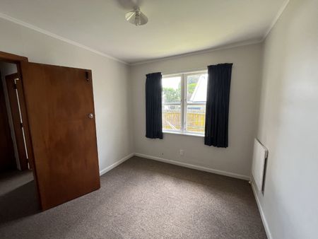 Inviting two-bedroom unit tucked away from the main road down a serene driveway. - Photo 2