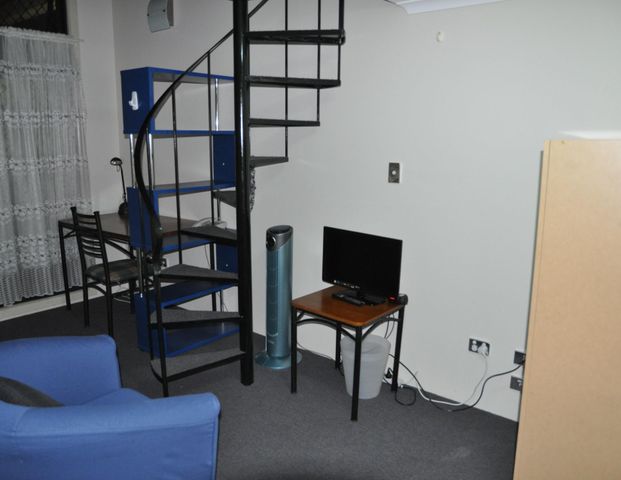 FURNISHED STUDIO LOFT STYLE IN THE HEART OF BROADWAY - Photo 1