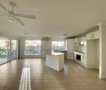 LARGE LOW-SET MODERN FAMILY HOME - Photo 1