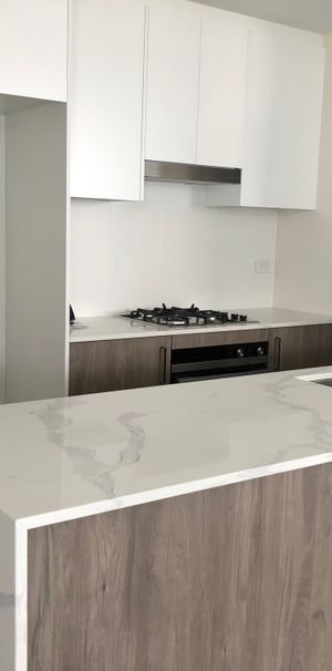 Modern two bedroom unit - 20% below market rent - Photo 1