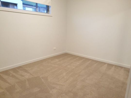 MODERN TWO BEDROOM TOWNHOUSE IN CONVENIENT LOCATION - Photo 1