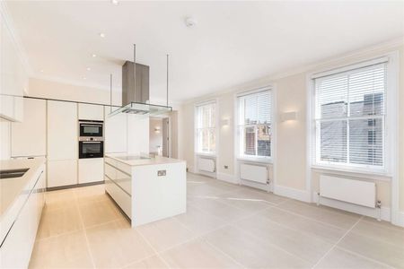 A beautiful third floor apartment (with lift) in a period building situated moments from Sloane Square and the amenities of Pavilion Road. - Photo 4
