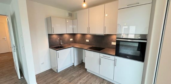 Modern wohnen mit Komfort: 2-Zimmer Wohnung mit Einbauküche, Fußbodenheizung, Süd-Balkon & Tiefgarage - Photo 2