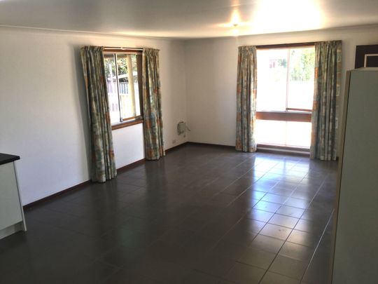 NESTLED AWAY IN A QUIET STREET - Photo 1