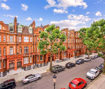 A beautifully presented two bed lateral apartment located in this prime location moments away from the transport links of Sloane Square and the amenities of the Kings Road. - Photo 1