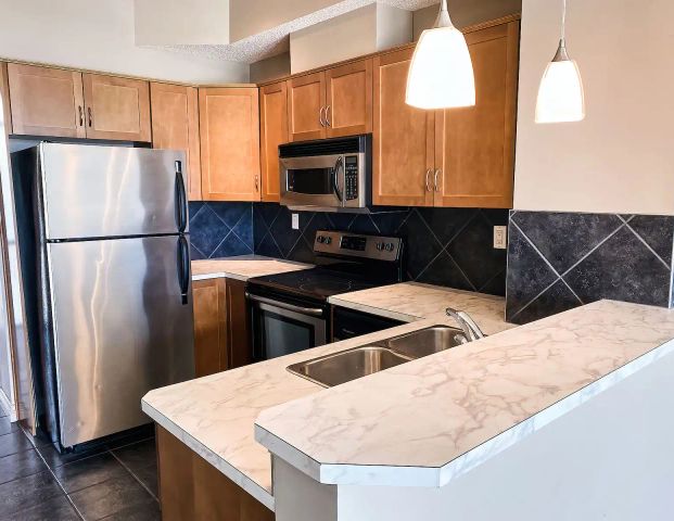 Large Two Bedroom Townhome in Rocky Ridge — 2 Bedrooms Townhouse - Photo 1