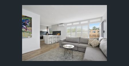 Sunny Top Floor Living Right in the Heart of Newport - Photo 4