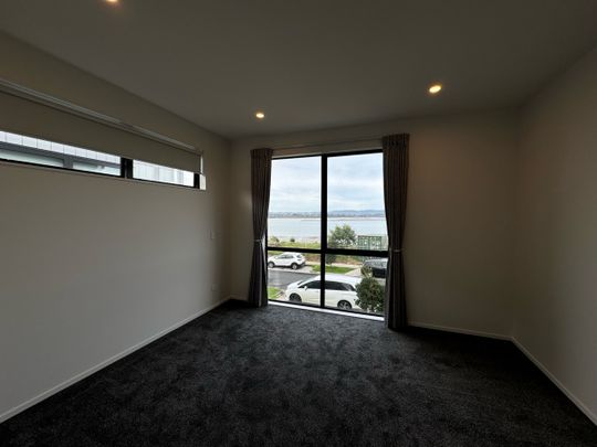 Near New Family Home in Hobsonville with Seaview - Photo 1