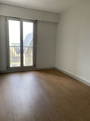 A LOUER - Jacobins - Appartement haut de gamme de 100.27 m² avec balcon, parking et cave. - Photo 5