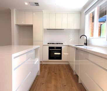 Modern Two Bedroom Freestanding Unit with Spacious Courtyard - Photo 6