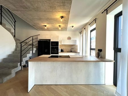 Exklusive und stilvolle Duplexwohnung im Erstbezug mit großer Terrasse und Tiefgaragenstellplatz im Herzen von Eupen - Photo 4