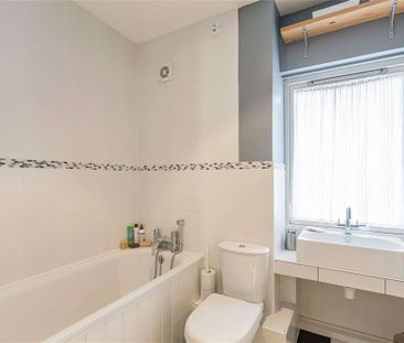 Modern four bedroom townhouse with off-street parking. - Photo 1