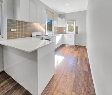 Charming Renovated Home in Prime Location - Photo 4