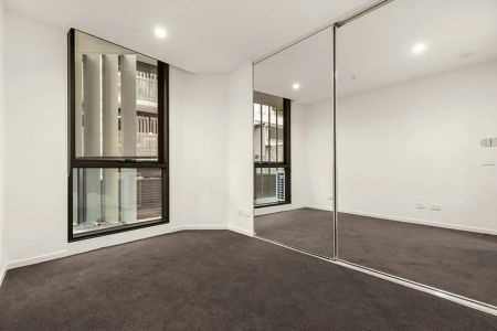 Modern Scandinavian-Style One-Bedroom + Study Apartment Moments from the CBD - Photo 2