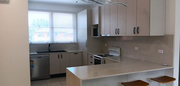 Stunning Renovated 2 Bedroom unit in quiet location - Photo 1