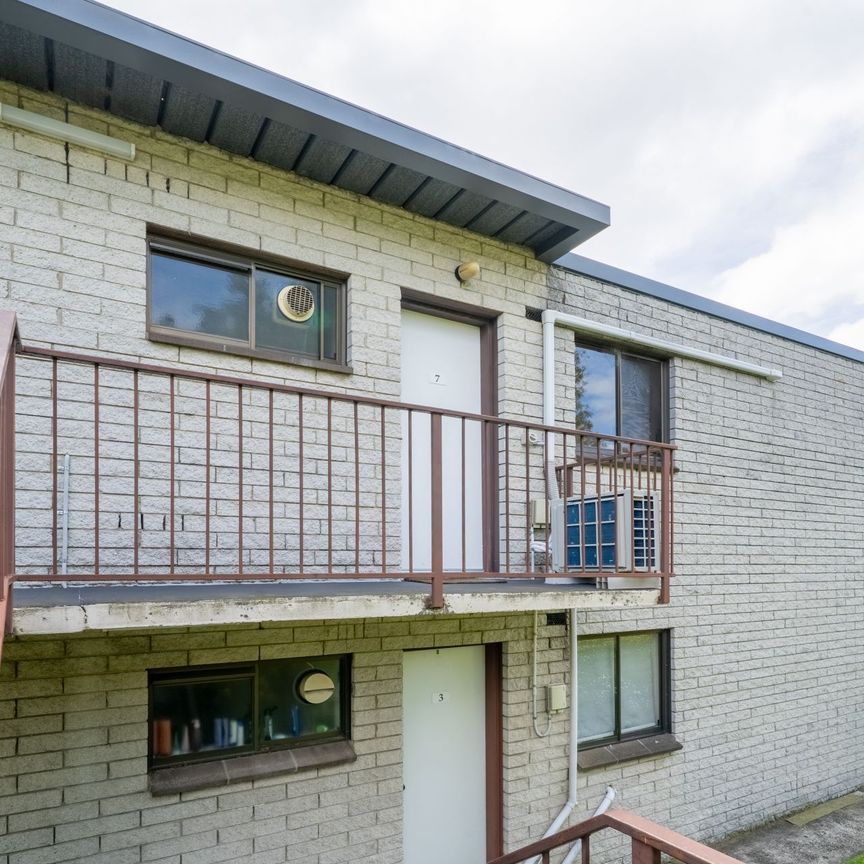 Located in a secure complex with a sunny outlook - Photo 1