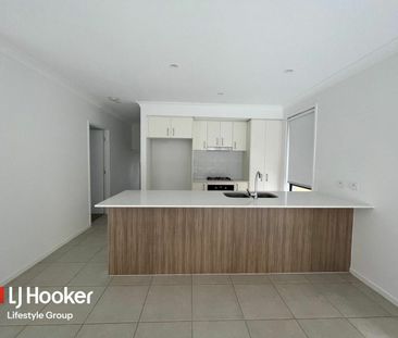 Tidy Four-Bedroom Home with Open-Plan Living & Outdoor Entertaining - Photo 4