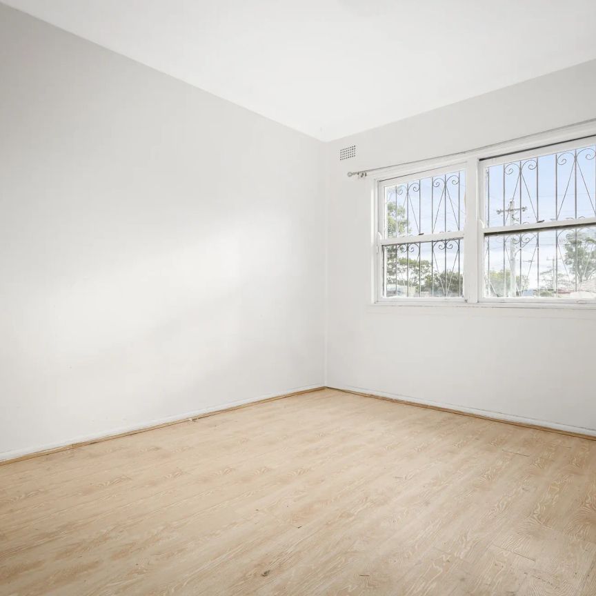 Spacious 3-Bedroom Brick Home on a Large Corner Block - Photo 1