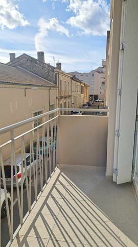 Location - Appartement T3 de 71 m² avec balcon, arrière cuisine, cave et garage - Photo 2