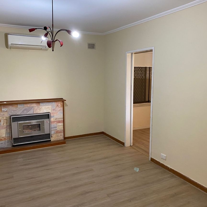 Comfortable Family Home with Generous Yard! - Photo 1