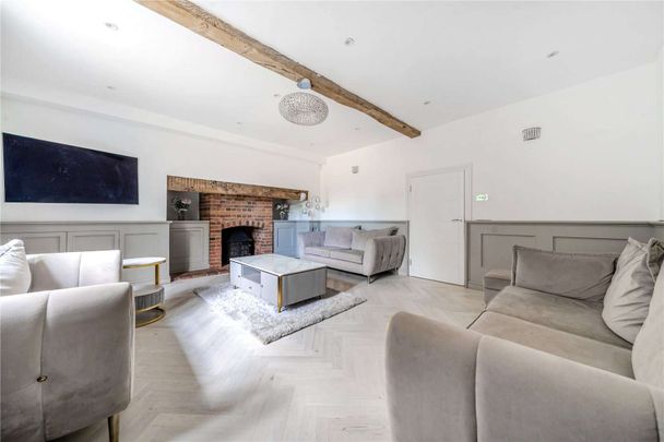 A stylish family home blending timeless character and modern living. - Photo 1