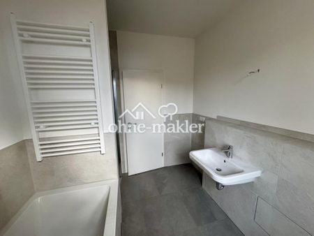 Erstbezug: Helle 3-Zimmer Wohnung mit Einbauküche, Terrasse, Garten und Stellplatz - Photo 4