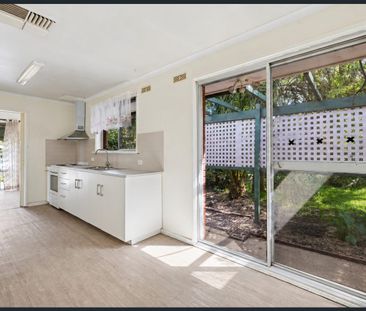 Comfortable Three-Bedroom Home with Gardens and Outdoor Entertaining - Photo 4