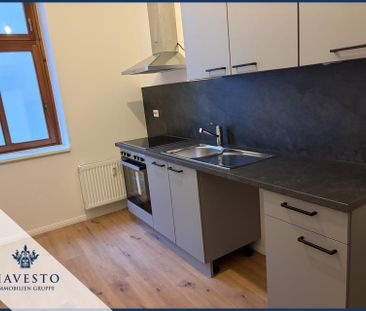 Frisch renovierte 2-Raumwohnung mit Einbauküche & ca. 50 m² Wohnkom... - Foto 1