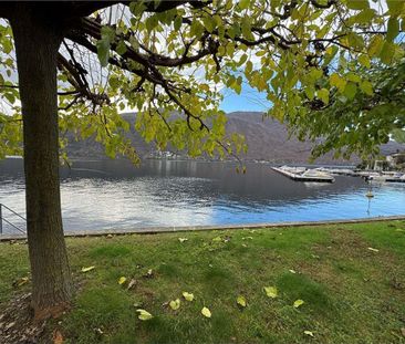 Luxurious 2.5-room duplex apartment with lake view in Morcote - Photo 3