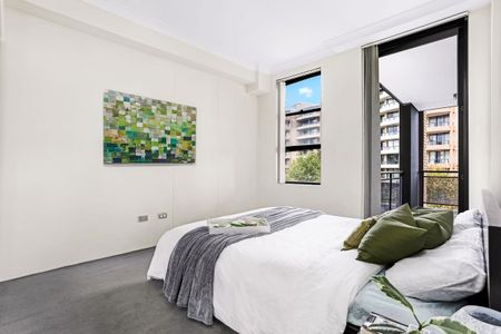 Stylish 2-Bedroom Apartment with Expansive Balcony - Photo 2