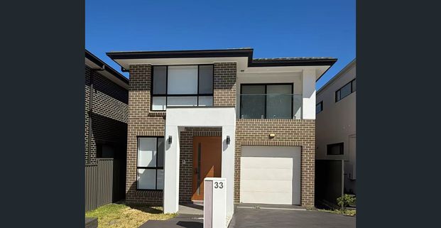 LUXURY MASTERPIECE IN HEART OF ROUSE HILL - Photo 1