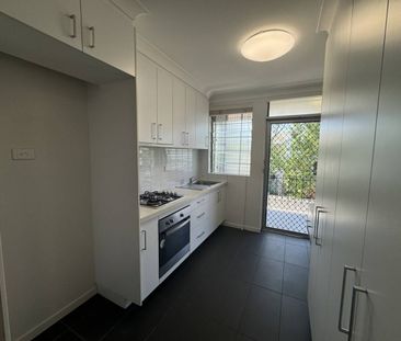 RENOVATED 1 BEDROOM IN QUIET COMPLEX - Photo 1