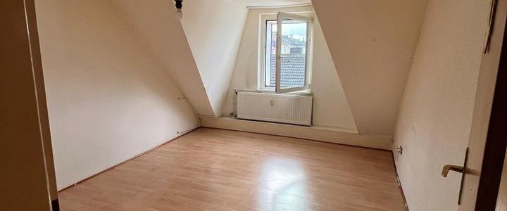 Gepflegte Dachgeschosswohnung zu vermieten - Foto 1