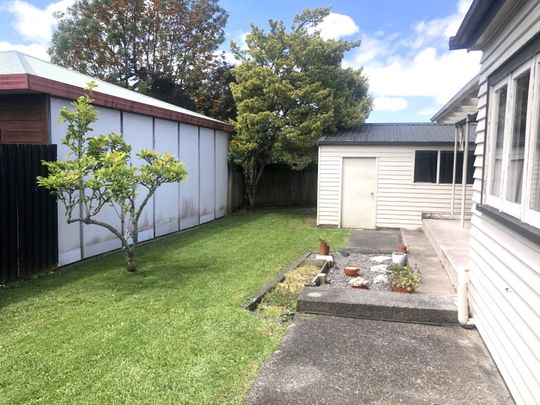 This is a well presented two bedroom home set on an easy care section with a fenced rear yard. - Photo 1