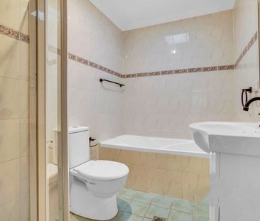 RENOVATED FOUR BEDROOM HOME! - Photo 6