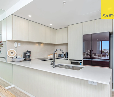 Luxury Living Awaits - Stylish 3-Bedroom Apartment in Hope Island R... - Photo 6