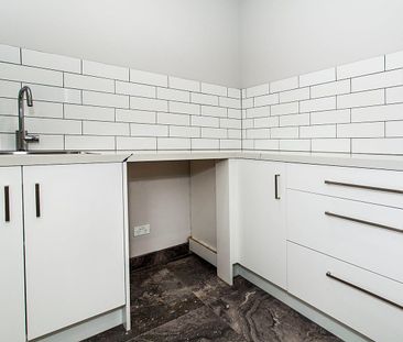 Low maintenance, modern living - Photo 4