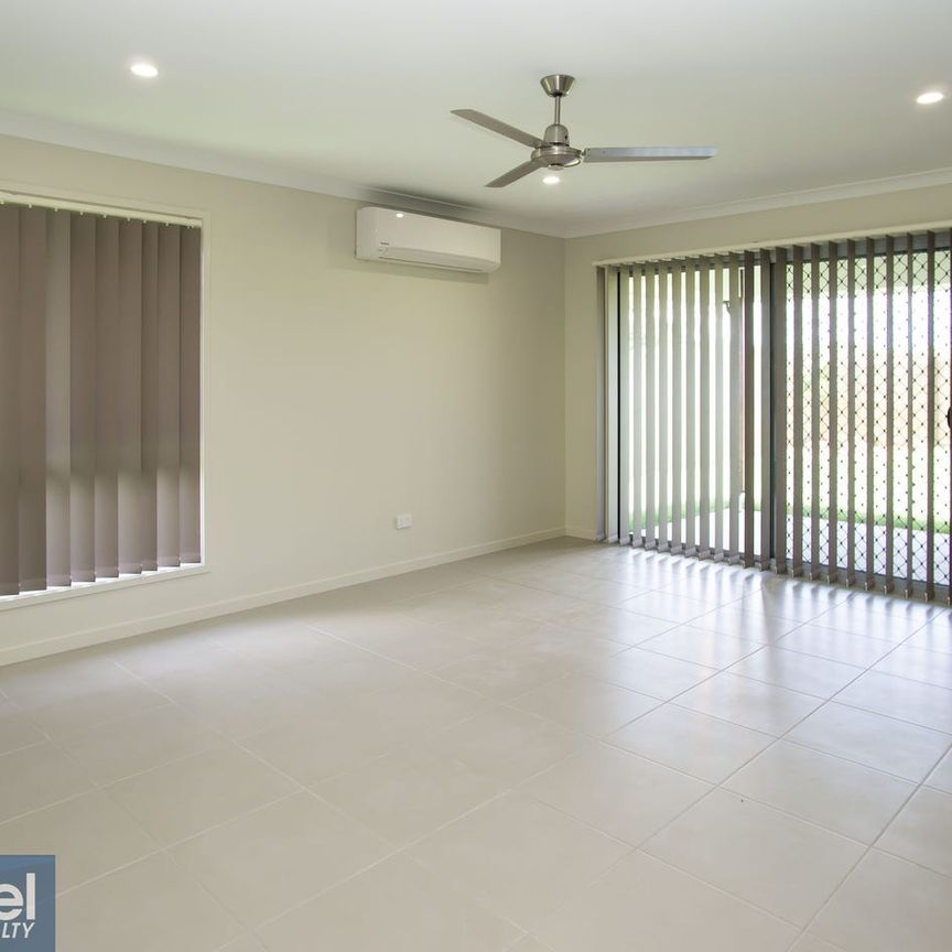 Modern 4 bedroom home in Riverbank estate - Photo 1