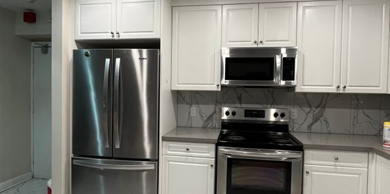 Newly renovated large bright 2 bedroom unit in a very quiet residential area - Photo 3