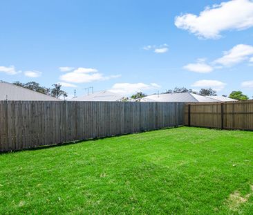 Modern Family Home in Logan Reserve - Photo 6