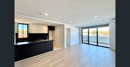 Fresh Painted & Brand New Timber Floor 2-bedroom apartment for lease in Belmore - Photo 2