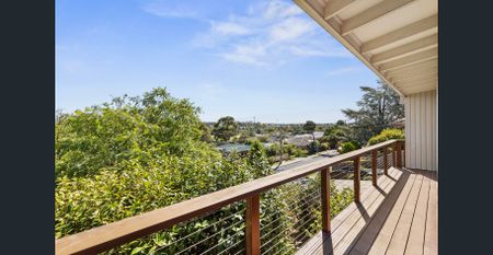 Spacious Family Home with City Views, Large Yard & Walk-to-Schools Location - Photo 3