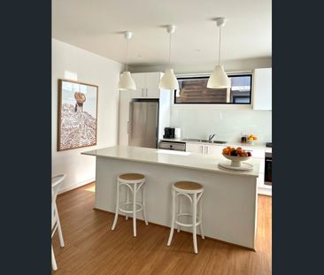 STYLISH TOWNHOUSE WITH INDOOR & OUTDOOR FLAIR! - Photo 1