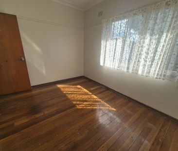 Neat & Tidy 3-Bedroom Home with Spacious Backyard! - Photo 1