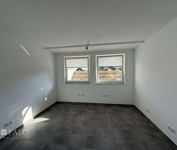 Wohnen im Neubau! Lichtdurchflutete Souterrainwohnung in Essen- Bed... - Photo 1