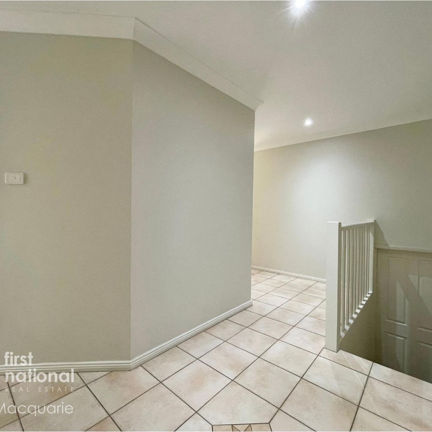 Spacious Split-Level Family Home with Multiple Entertaining Areas - Photo 1
