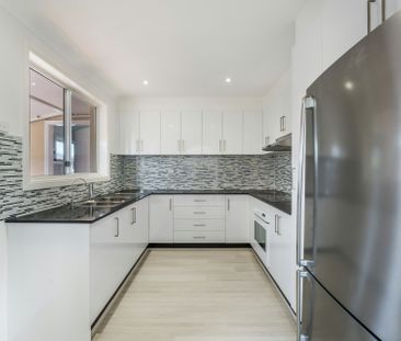 PRISTINE FOUR BEDROOM HOME - Photo 6