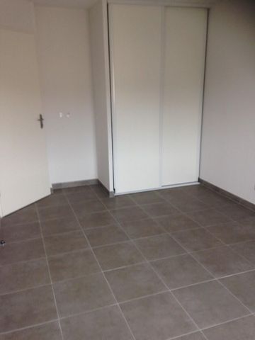 location Appartement T3 DE 58.8m² À LE HAILLAN - Photo 2